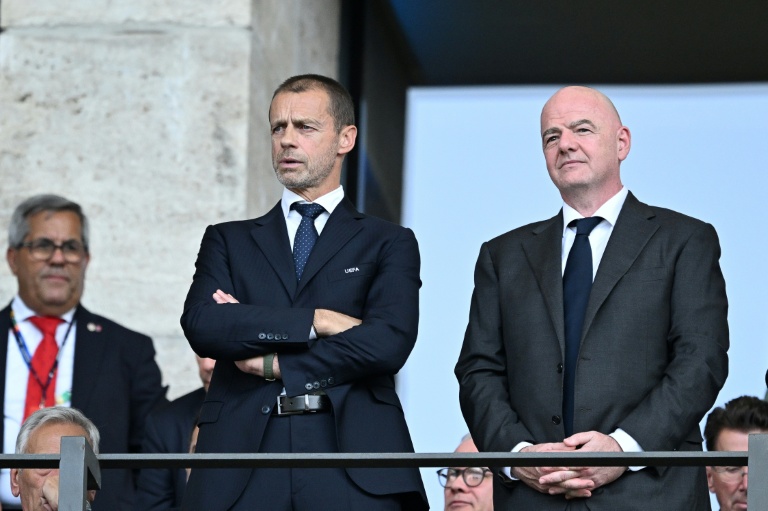 Uefa under its President Aleksander Ceferin, centre left, is threatening a legal suit against FIFA chief Gianni Infantino for criminal mismanagement. (Photo: AFP)