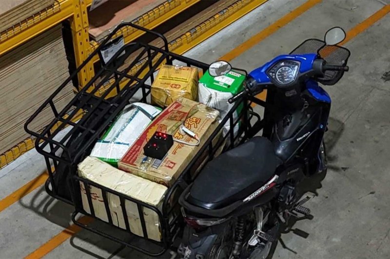 The motorcycle-sidecar combo loaded with explosives and left by armed insurgents who bombed a Global House department store in Pattani on Saturday night. (Photo: สวท.ปัตตานี News Facebook)