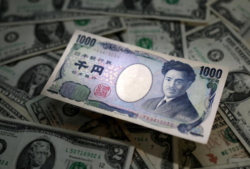Japanese Yen and US dollar banknotes are seen in this illustration taken March 10, 2023. (File photo: Reuters)