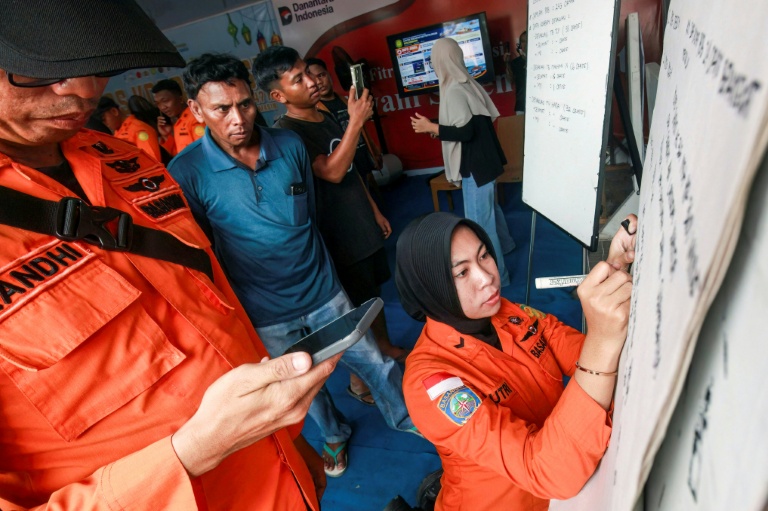 Rescuers battled waves of up to 2.5 metres (8.2 feet) to reach the stricken ferry