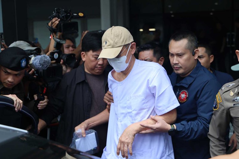 Atichot Tanprasert in police custody on Sept 11. Police photo