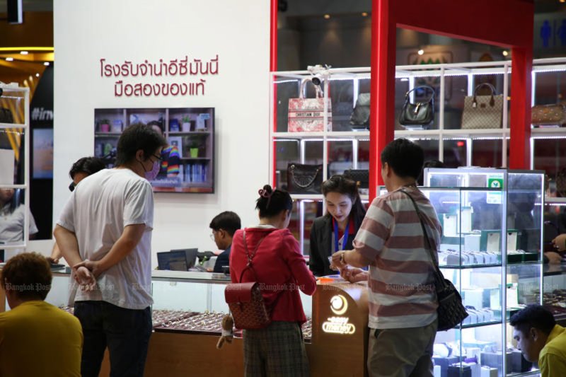 Visitors at a pop-up pawn shop at Money Expo in Bangkok on May 16, 2024. (Photo: Varuth Hirunyatheb)
