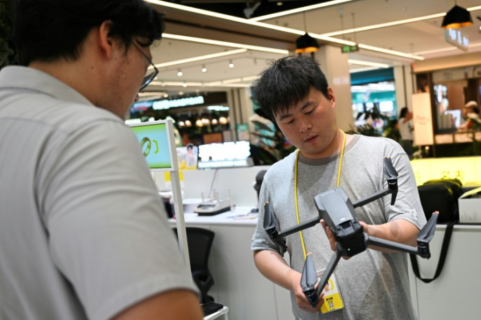 Drone owners rush to offload gear ahead of Beijing ban - Bangkok Post