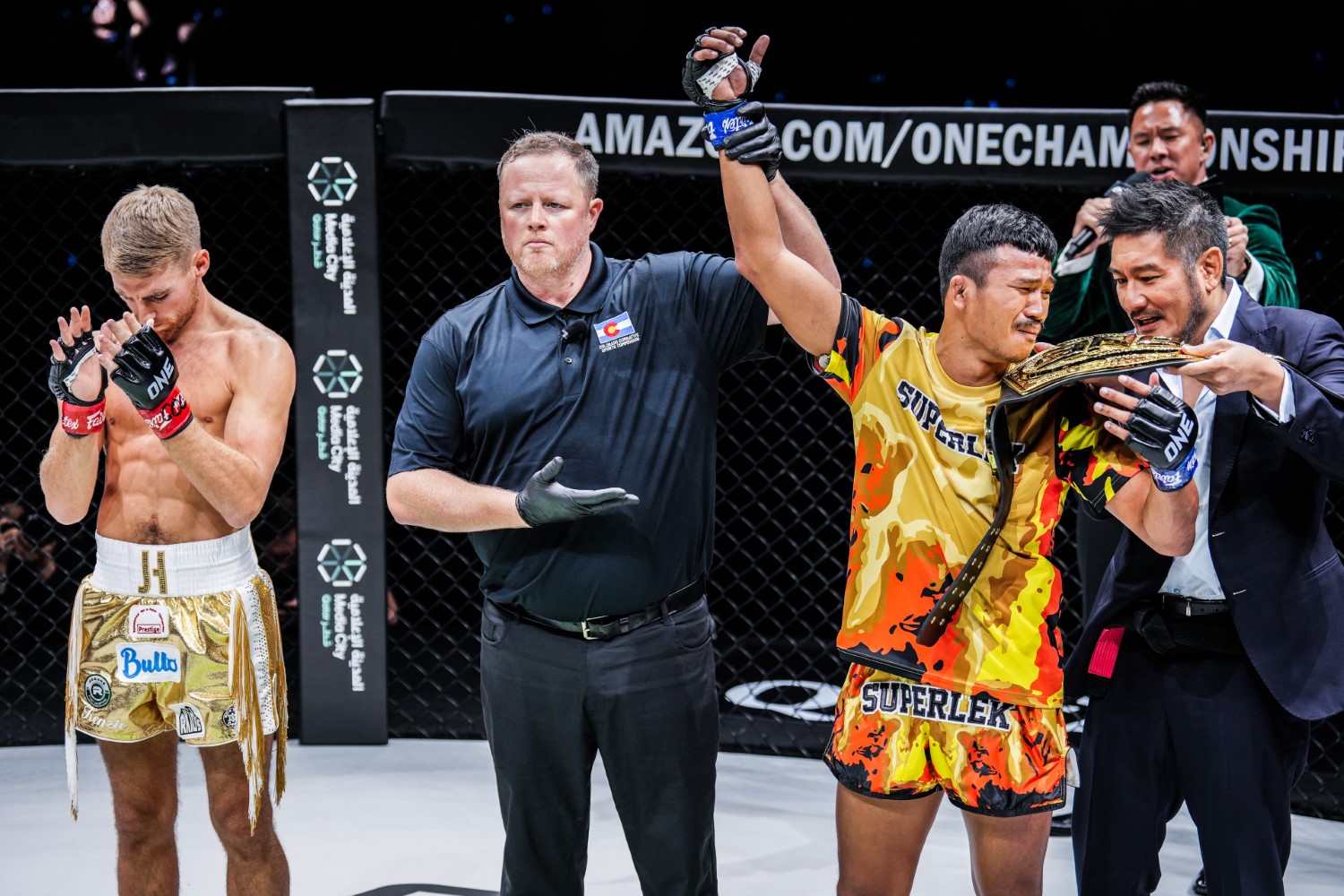 Superlek Kiatmoo9 celebrates after stopping Jonathan Haggerty to win the ONE bantamweight Muay Thai title at ONE 168 in Denver