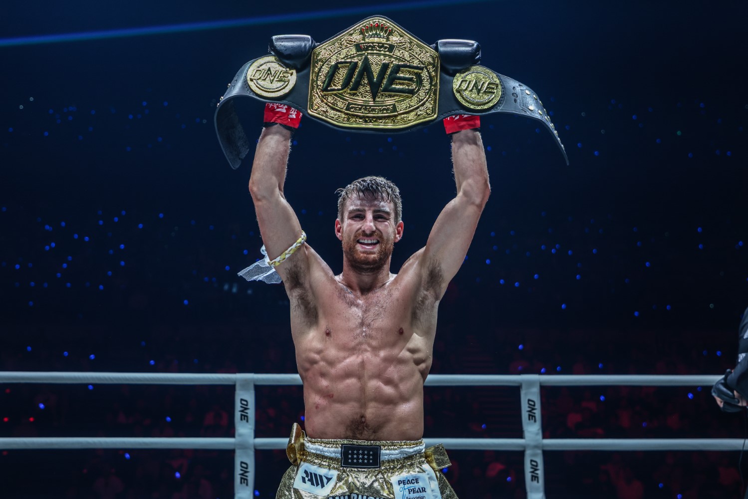 Jonathan Haggerty celebrates after retaining his ONE bantamweight kickboxing title against Yuki Yoza at ONE Samurai 1 in Tokyo