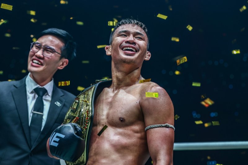 Superlek celebrates after defeating Takeru to retain his ONE flyweight kickboxing title at ONE 165 in Tokyo