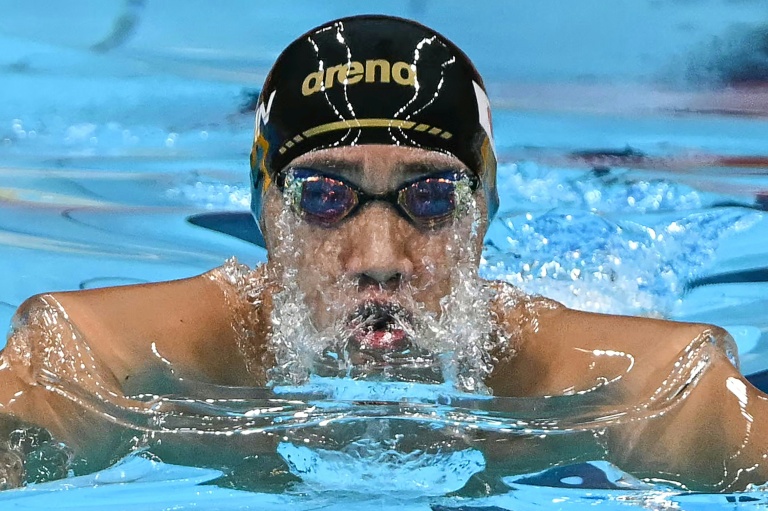 Japan’s Shin Ohashi cut more than half a second off the previous world record in the 200-metre men’s breaststroke, with a time of 2 minutes 04.83 seconds. (Photo: AFP)