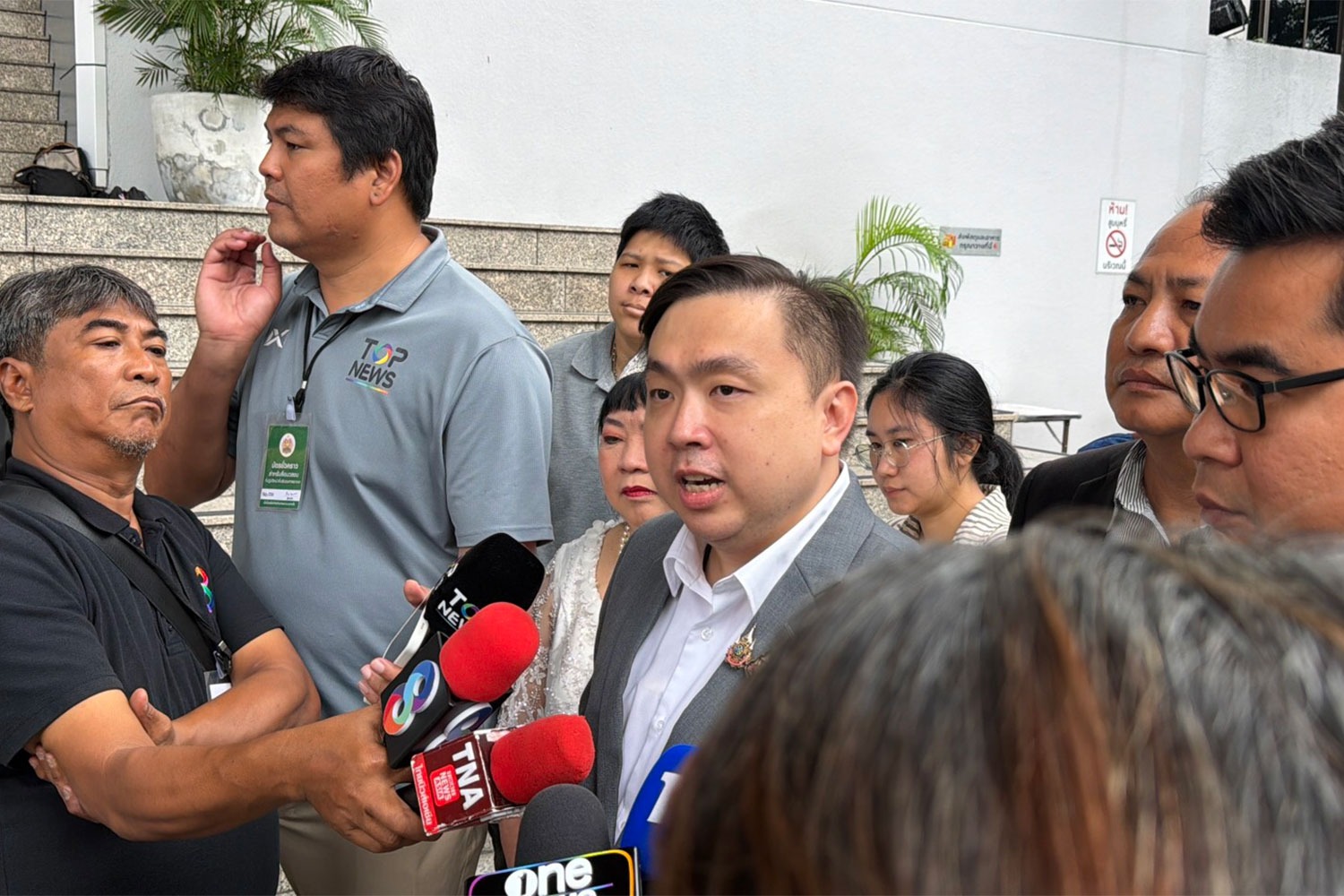 Samart Janechaijittawanich, former deputy spokesman for the Palang Pracharath Party (PPRP), speaks to reporters on Friday after the Criminal Court acquitted him, his mother and The iCon Group CEO Warathaphon “Boss Paul” Waratyaworrakul of charges of colluding to launder 2.5 million baht from the direct-sales company. (Photo supplied/Wassayos Ngamkham)