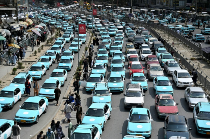Rebellious Afghan taxi drivers defy ban on music - Bangkok Post