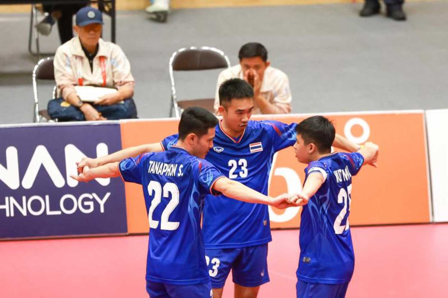 Thai sepak takraw players celebrate a point during the semi-final match against Vietnam. TAKRAW ASSOCIATION OF THAILAND