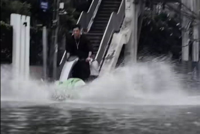 Jet ski 'drifter' surfing Bangkok flood arrested, fined - Bangkok Post