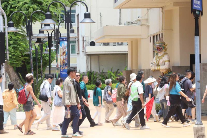 Tourists head for Sala Chalermkrung Royal Threatre in Bangkok in August. (Photo: Apichart Jinakul)