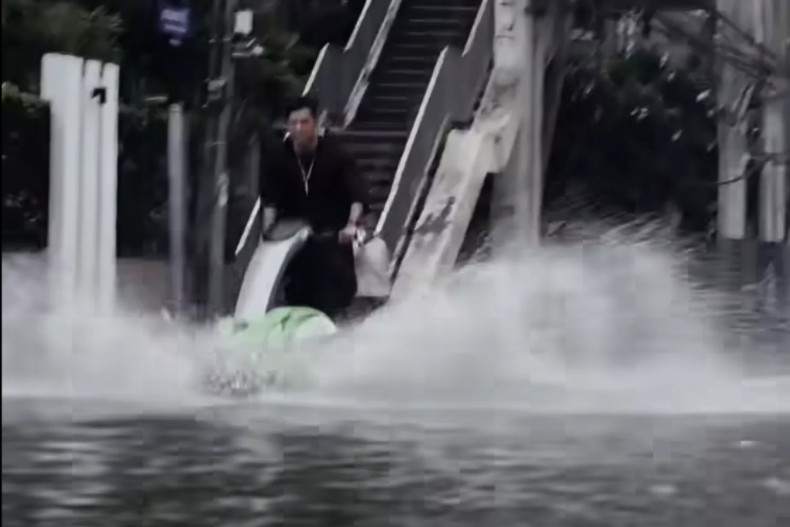 Jet ski 'drifter' surfing Bangkok flood arrested, fined