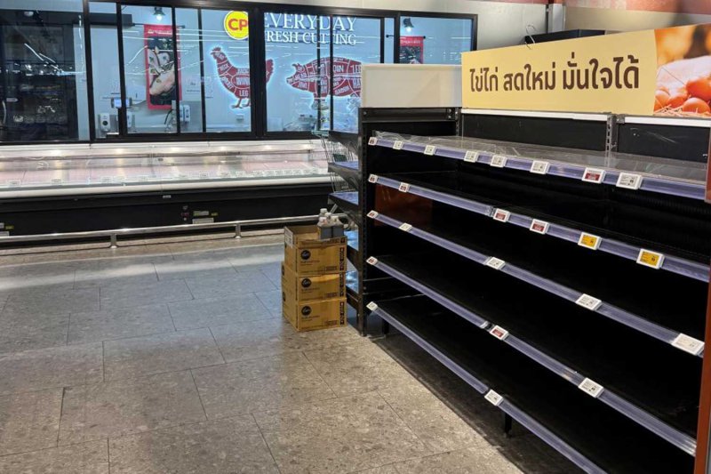 Empty egg shelves at a Bangkok supermarket on Sunday.
