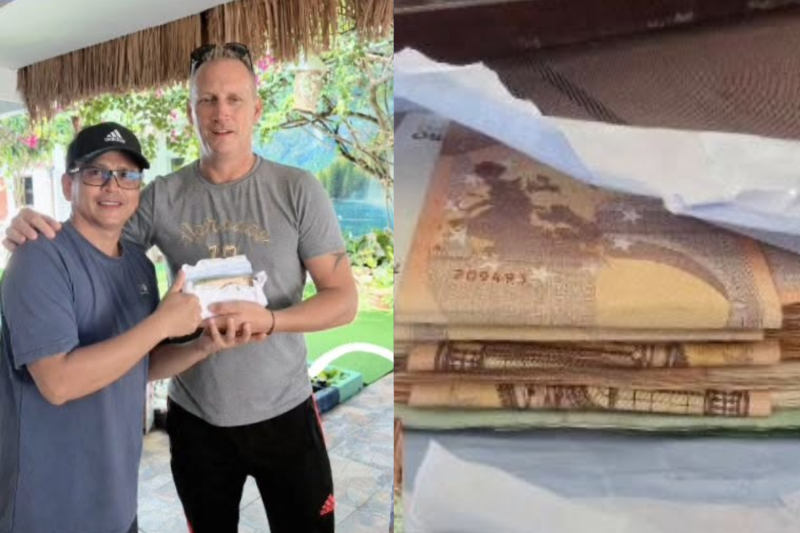 Guy Petcharat, the owner of an accommodation near Phuket airport, left, returns a bundle of euro banknotes valued at around 100,000 baht to a French tourist. (Photo: Guy Petcharat)