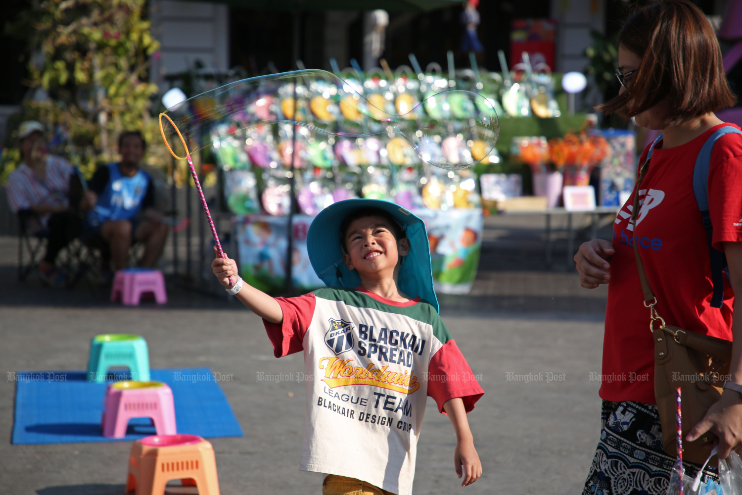 A boy has fun at the Maha Songkran Siam event at Siam Amazing Park in 2024. (Bangkok Post file photo)