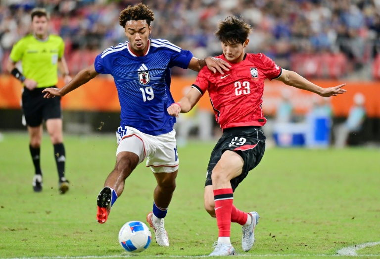 South Korea beat Japan in the men's football final. afp