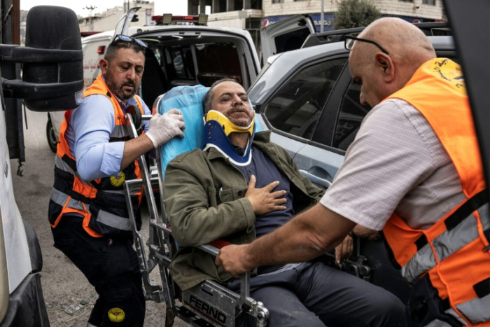 Photo: Bangkok Post Israeli Settlers Assault AFP Photographer Jaafar Ashtiyeh in West Bank