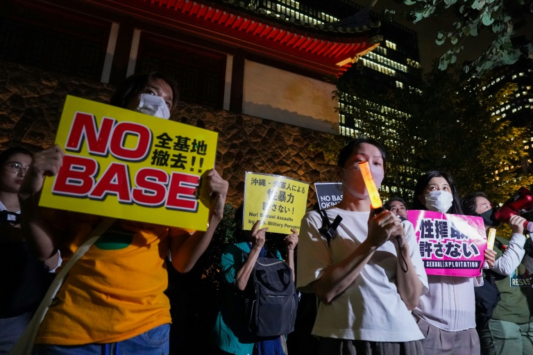The killing of a Japanese woman has triggered protests against US military bases in Japan.