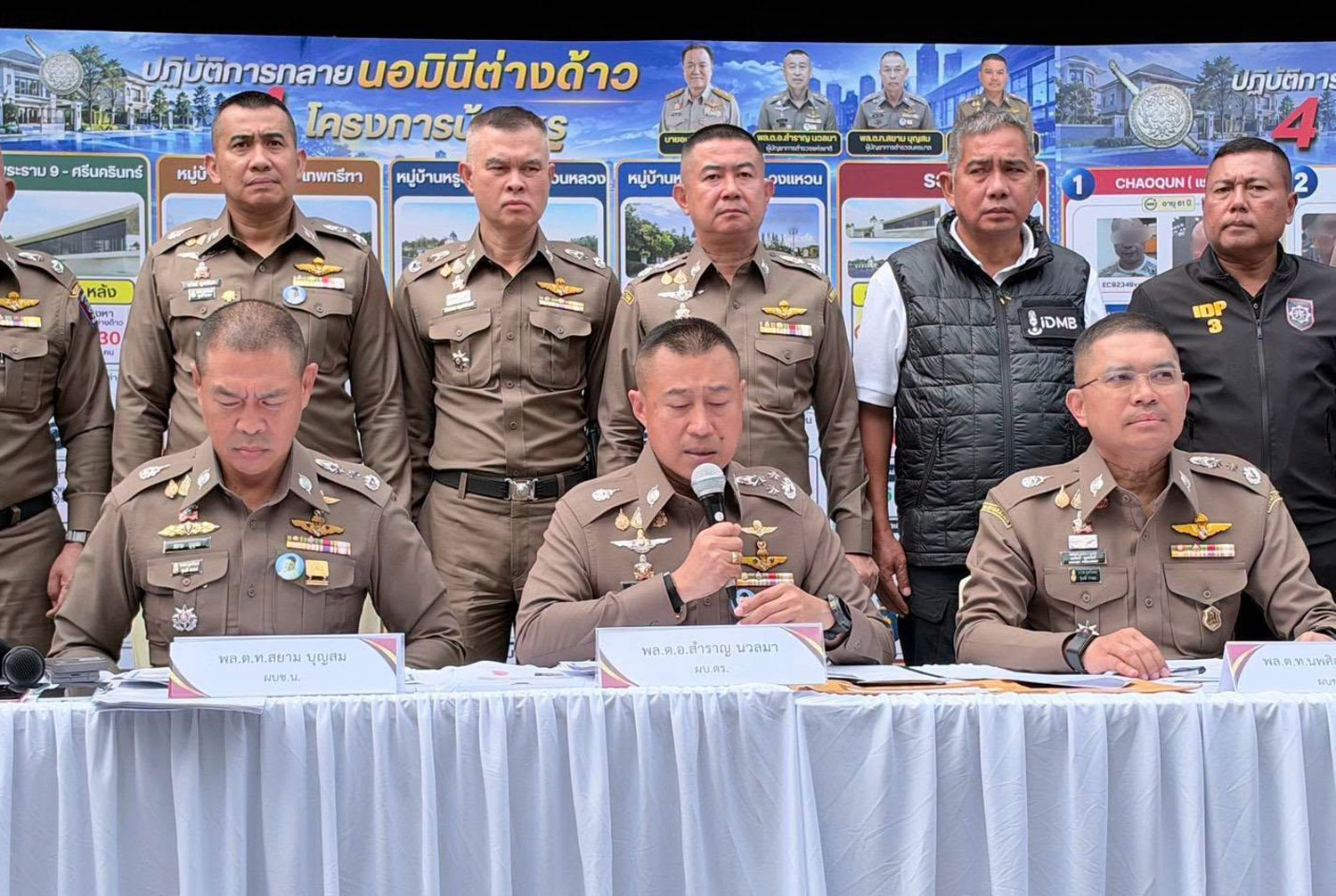 National police chief Samran Nualma (seated, centre) gives details of the crackdown operation on foreign nominees following raids on 17 locations in Bangkok on Saturday. (Photo: Provincial Police Region 2)