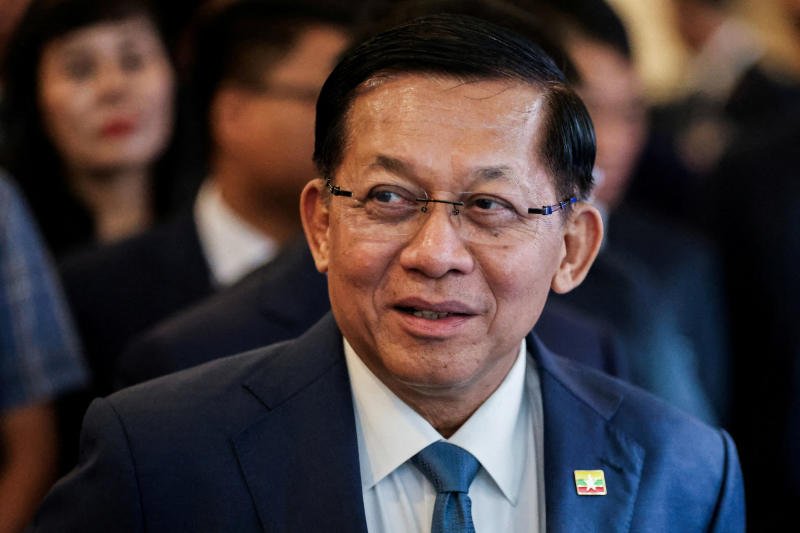 Gen Min Aung Hlaing gestures at the Vietnam-Myanmar Business Forum during his official state visit to Vietnam, in Hanoi, on Sept 6. The Myanmar president was the 2021 coup leader. (Photo: Reuters)