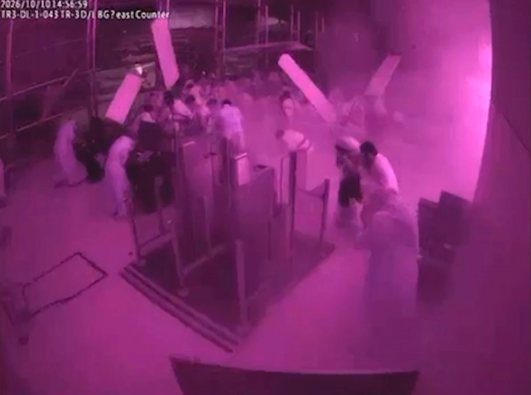 A screen grab taken from CCTV footage released by the Saudi media ministry shows the moment King Khalid International Airport was hit by a strike.