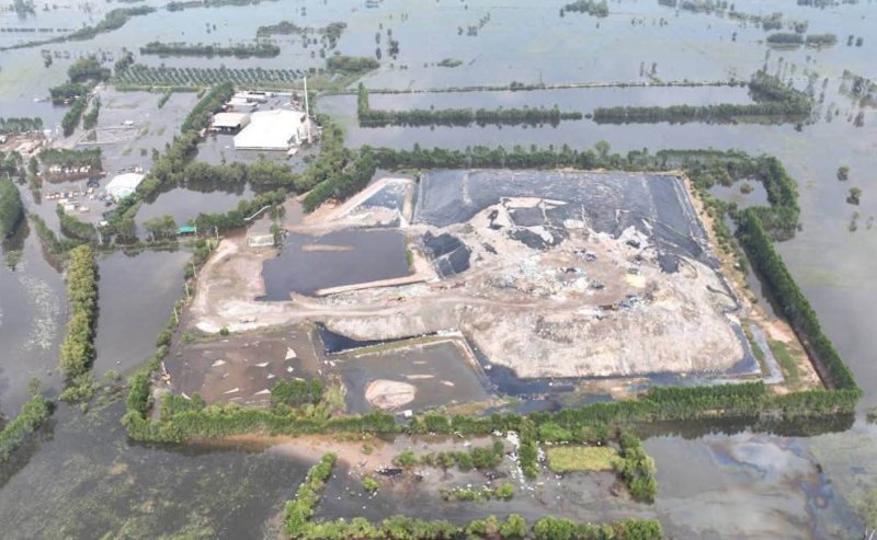 An aerial view shows an industrial waste landfill of Green Environment Technology Co Ltd, which is suspected of being a source of water pollution in Si Maha Phot district of Prachin Buri. It was ordered to suspend operations pending further investigation. (Photo: Prachin Buri Public Relations Department)