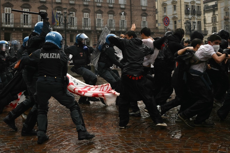 Police clash with protesters in Turin on ‘No Meloni Day’, a national day of marches across Italy inspired by similar activities in France and Spain, to protest against the cost of living. (Photo: AFP)