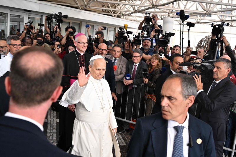 Pope Leo XIV waves to well-wishers as he walks unaided out of Gemelli University Hospital, four days after surgery to remove a cancerous tumour from his right lung, in Rome on Oct 17, 2026. (Photo: AFP)