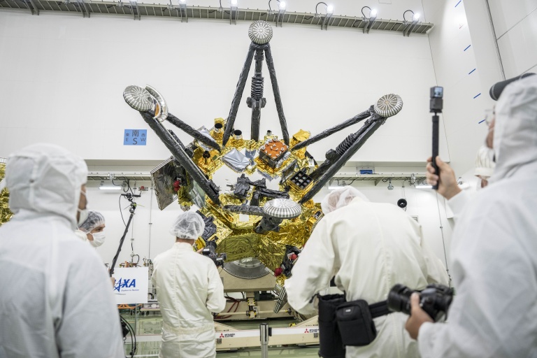 Members of the media film Exploration and Return Modules, making up the Martian Moons eXploration (MMX) spacecraft, at the Tanegashima Space Center in Minamitane, Kagoshima prefecture on August 13, 2026
