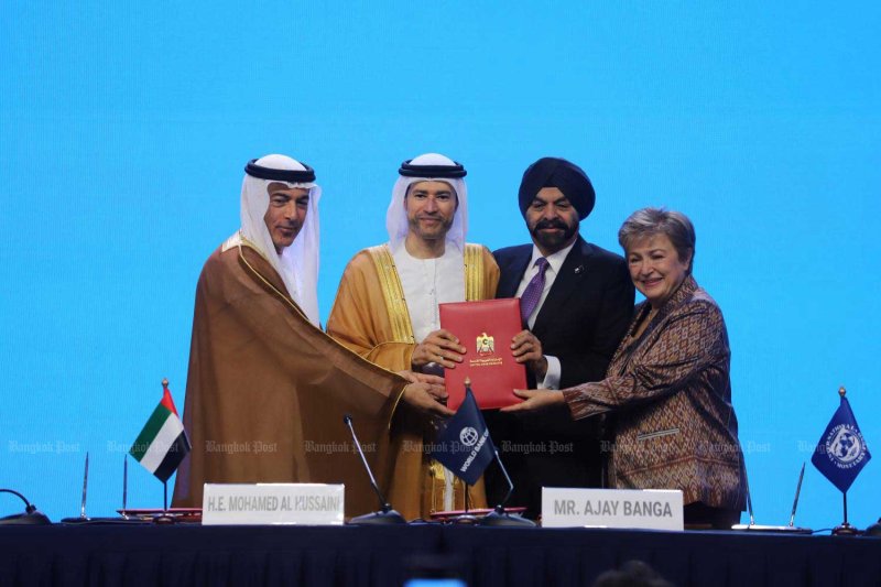 United Arab Emirates Central Bank Governor Khaled Mohamed Balama, UAE Minister of State for Financial Affairs Mohamed bin Hadi Al Hussaini, World Bank President Ajay Banga and IMF Chief Kristalina Georgieva attend a signing ceremony in Bangkok on Sunday to officially name Abu Dhabi as the host of the 2029 Annual Meetings. Apichart Jinakul