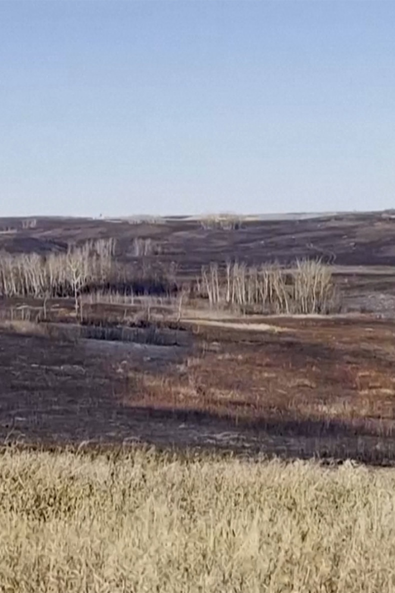 Firefighters tackle hotspots of deadly blaze at Canadian military base