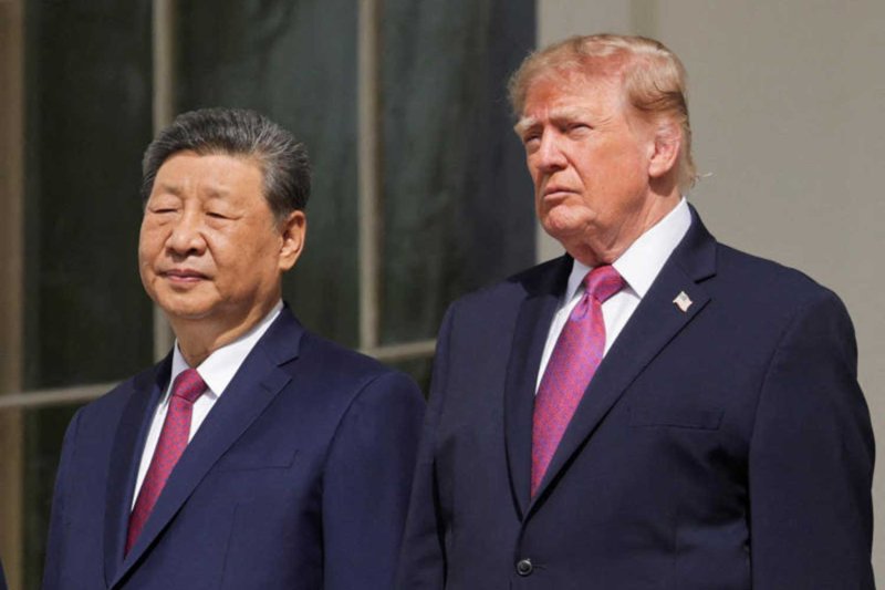 US President Donald Trump and Chinese President Xi Jinping watch a military demonstration from a balcony of the White House in Washington, D.C., US, September 24, 2026. REUTERS
