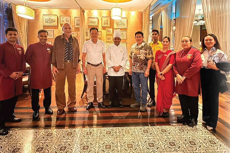 Prime Minister Anutin Charnvirakul, fourth from left, and Capt Thamanat Prompow, fifth from right, were pictured at Punjab Grill Bangkok in a post on the Facebook page of the restaurant on Oct 15.