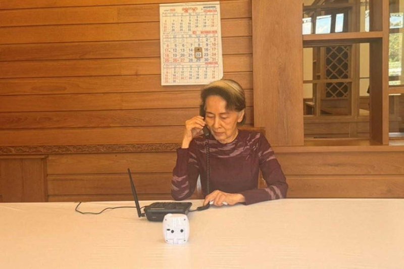 Myanmar's former leader Aung San Suu Kyi talks on the phone to her son, Kim Aris, who is at Myanmar's embassy in London, in Myanmar, October 22, 2026. Myanmar Presidential Spokesperson/Handout via REUTERS.
