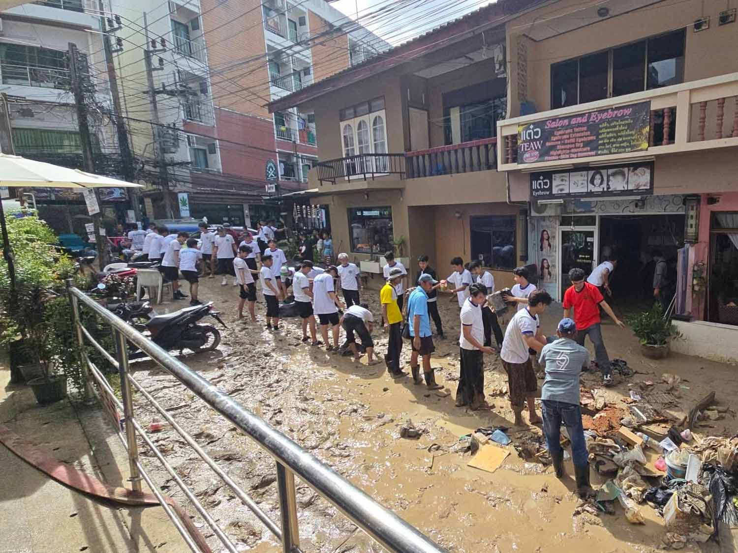 Volunteers help to clean up Bangla Road on Tuesday.