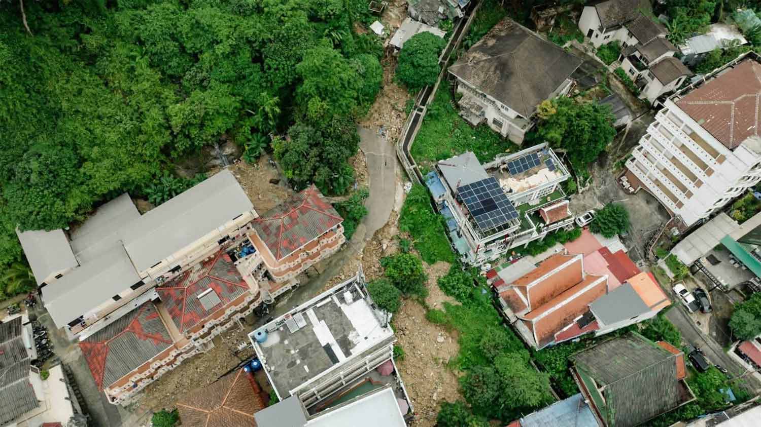 A bird’s-eye view of a mudslide-damaged area.