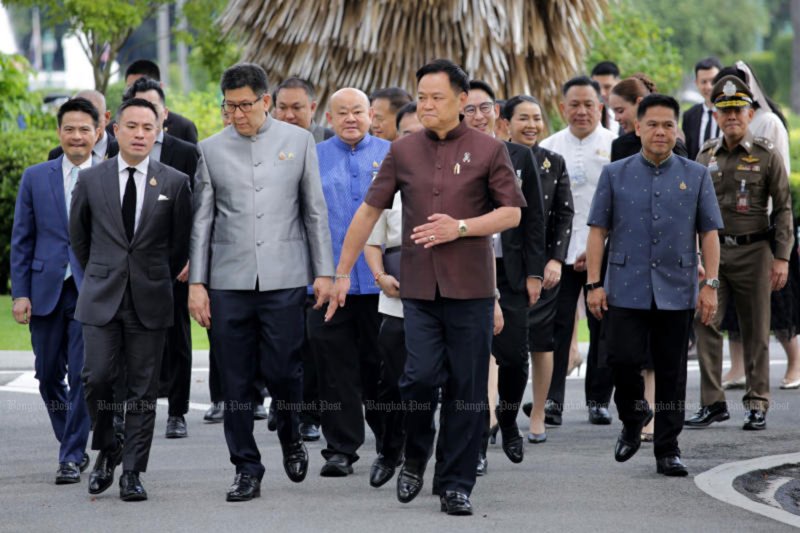 Prime Minister Anutin Charnvirakul leads cabinet ministers to a weekly cabinet meeting at Government House on Tuesday. (Photo: Chanat Katanyu)