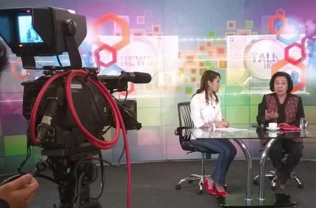keeping the peace: Tida Tawornseth, right, made her return broadcasting on the renamed Peace TV on Sept 1.