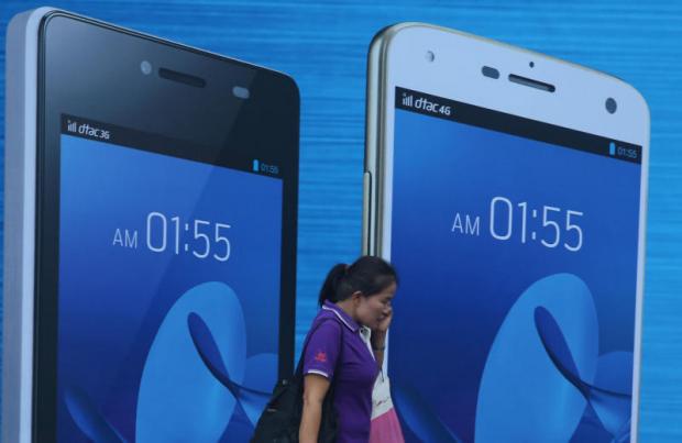 DTAC posts record profit drop in Q2