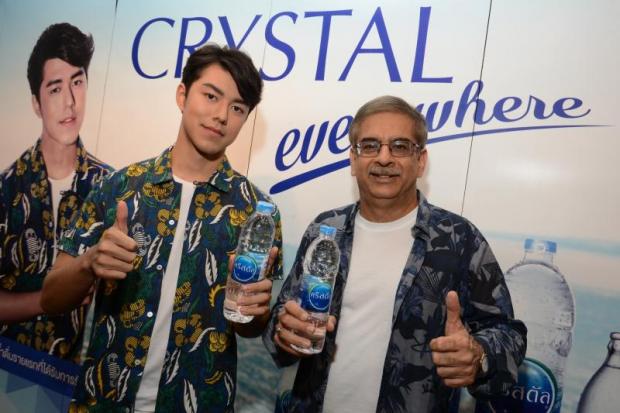 Mr Chhabra (right) with Crystal presenter Naphat 'Nai' Siangsomboon.