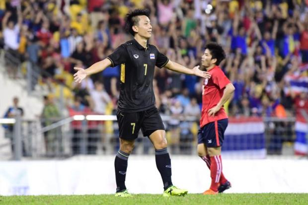 Thailand's Nattawut Sombatyotha reacts after scoring a goal against Cambodia.