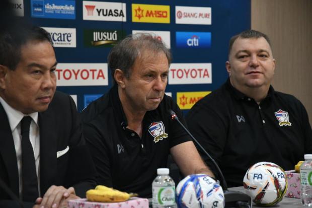 FAT president Somyot Poompunmuang, left, and coach Milovan Rajevac, centre.