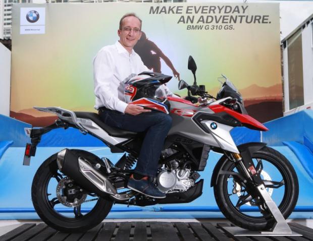 Mr Glaeser unveils the new G 310 GS, part of BMW's push into the mid-sized motorcycle market.