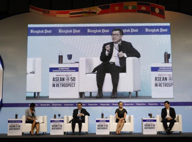 Mr Somporn (second left), Ms Somruedee and Mr Tan at the panel discussion moderated by Pavida Pananond (far left) of Thammasat Business School. (Photo by Pattarapong Chatpattarasill)