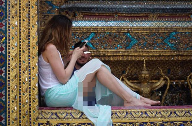 Serbian pair fined after temple 'legs' photos spread