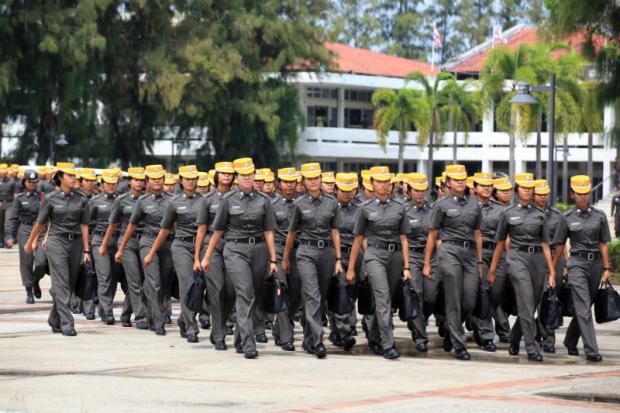 Female police cadets file into the grounds of the Royal Police Cadet Academy after their admission to the institute. The academy has made a controversial decision to scrap the admission of female cadets with immediate effect. Phrakrit Juntawong Female police cadets file into the grounds of the Royal Police Cadet Academy after their admission to the institute. The academy has made a controversial decision to scrap the admission of female cadets with immediate effect. Phrakrit Juntawong