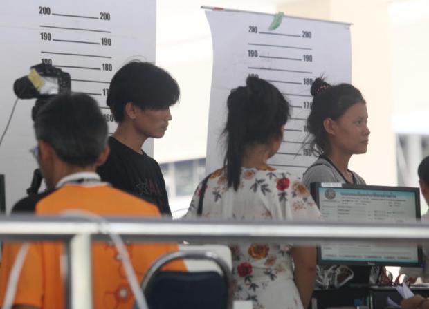 Foreign workers register at the Labour Ministry in June. APICHIT JINAKUL