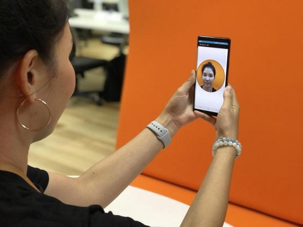 The TMB mobile app's facial recognition system lets customers open accounts using their smartphones.