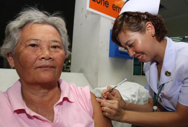 An elderly woman receives a vaccination at a hospital in Nonthaburi. Statistics show women seek medical care from public hospitals more than men. TAWATCHAI KEMGUMNERD An elderly woman receives a vaccination at a hospital in Nonthaburi. Statistics show women seek medical care from public hospitals more than men. TAWATCHAI KEMGUMNERD